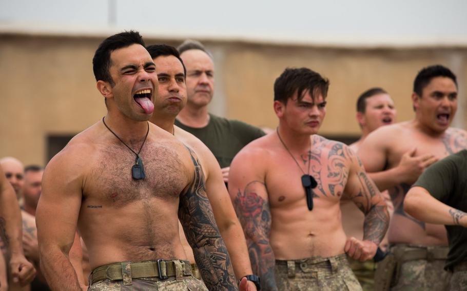 New Zealand servicemembers, from the Australian and New Zealand Task Group Taji, preform a traditional Maori haka dance, welcoming new members of Task Group Taji, Camp Taji, Iraq, May 18, 2019. New Zealand has declined a NATO request to retain military advisers in Iraq, a decision that came just prior to a visit from Defense Secretary Mark Esper during his tour of the Pacific. 


