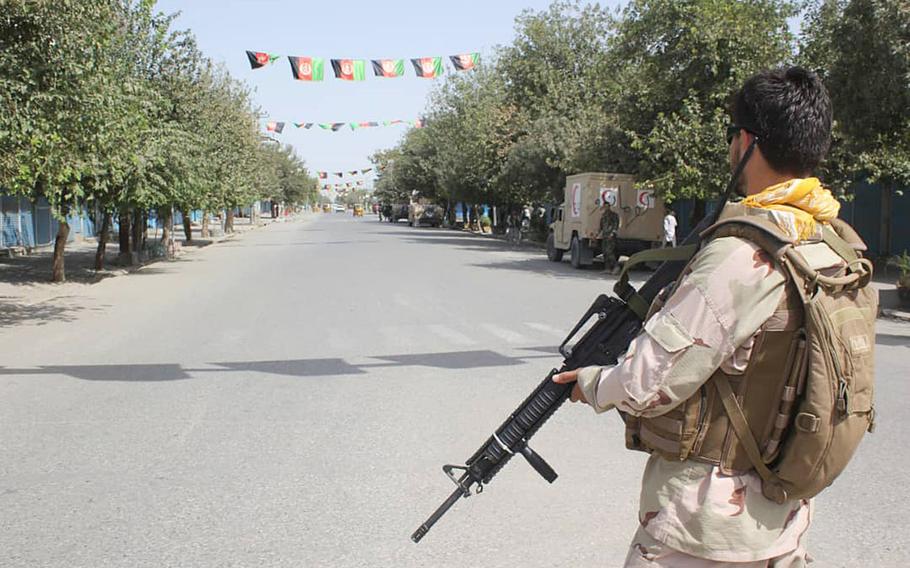 Afghan security forces stand guard during a fight against Taliban fighters in Kunduz province north of Kabul, Afghanistan, Saturday, Aug. 31, 2019. 
