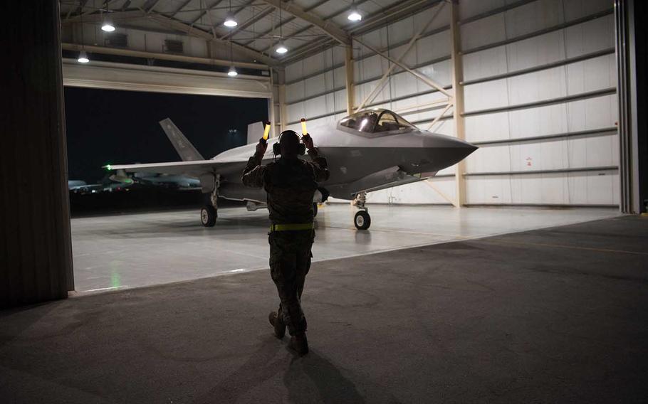 A U.S. Air Force F-35A Lightning II aircraft, assigned to the 4th Expeditionary Fighter Squadron, is guided from the hangar Sept. 10, 2019, at Al Dhafra Air Base, United Arab Emirates. F-15s and F-35s dropped 80,000 pounds of bombs on an island in the Tigris River in Iraq.