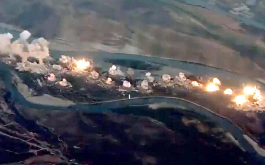 A image from a video released by Combined Joint Task Force shows 80,000 pounds of bombs being dropped on an island believed to be used by ISIS, Sept. 10, 2019. 

