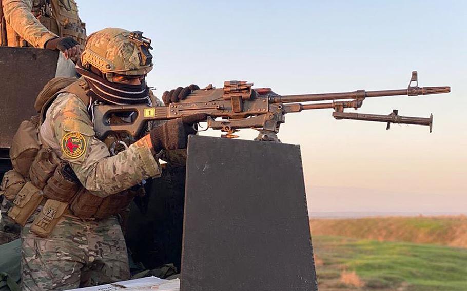 A member of Iraq's Rapid Response Division is pictured here at an undisclosed location on the morning of Sunday, Dec. 29, 2019, during the early hours of the eighth phase of the government's Will of Victory campaign to ensure the lasting defeat of the Islamic State group in the country. The division was one of several Iraqi security forces units participating in the operations throughout Anbar, Ninevah, Salahuddin, Kirkuk and Diyala provinces.