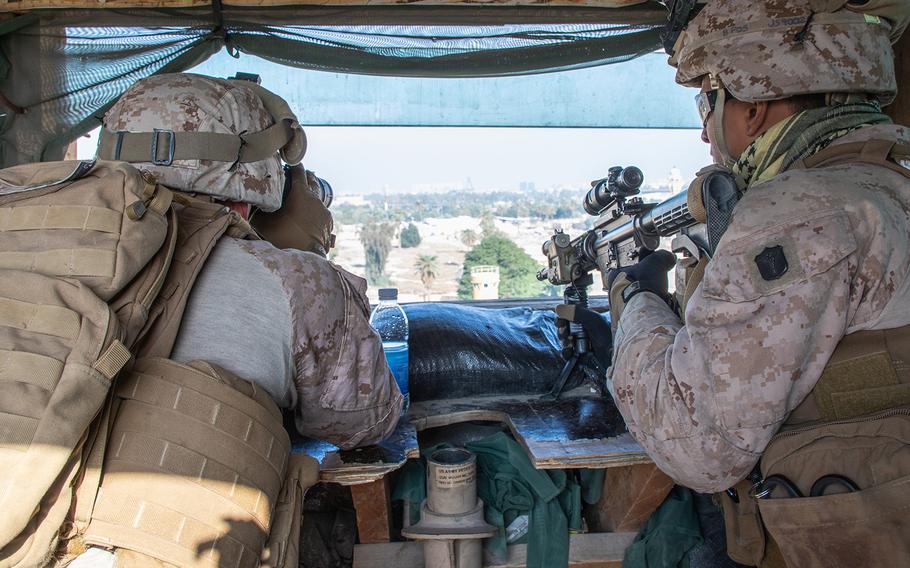 U.S. Marines with 2nd Battalion, 7th Marines, assigned to the Special Purpose Marine Air-Ground Task Force-Crisis Response-Central Command 19.2, reinforce the Baghdad Embassy Compound in Iraq, Jan. 3, 20202.
