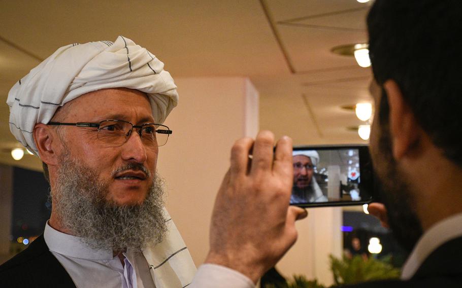 Taliban official Abdul Salam Hanafi speaks to reporters in Pashto and Dari on the eve of a historic agreement between the militant group and the United States in Doha, Qatar, Feb. 28, 2020.