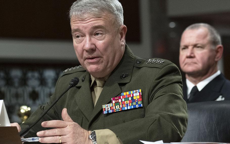 Gen. Kenneth F. McKenzie, Jr., commander of the United States Central Command, testifies at a Senate Armed Services Committee hearing on Capitol Hill, March 12, 2020. Behind him is Fleet Master Chief James Herdel, CENTCOM's senior enlisted leader.