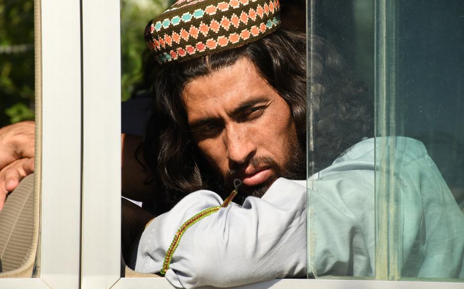 A recently freed Taliban prisoner waits to be transported from Bagram prison on Tuesday, May 26, 2020. 