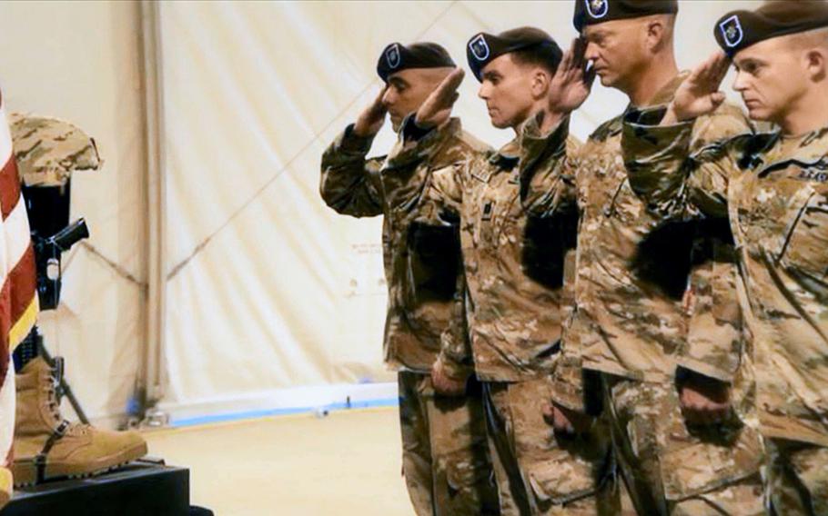 Soldiers of the 1st Security Force Assistance Brigade honor fallen Command Sgt. Maj. Timothy Bolyard, who was killed in an insider attack in Sept.2018, at a memorial ceremony in Afghanistan. 

