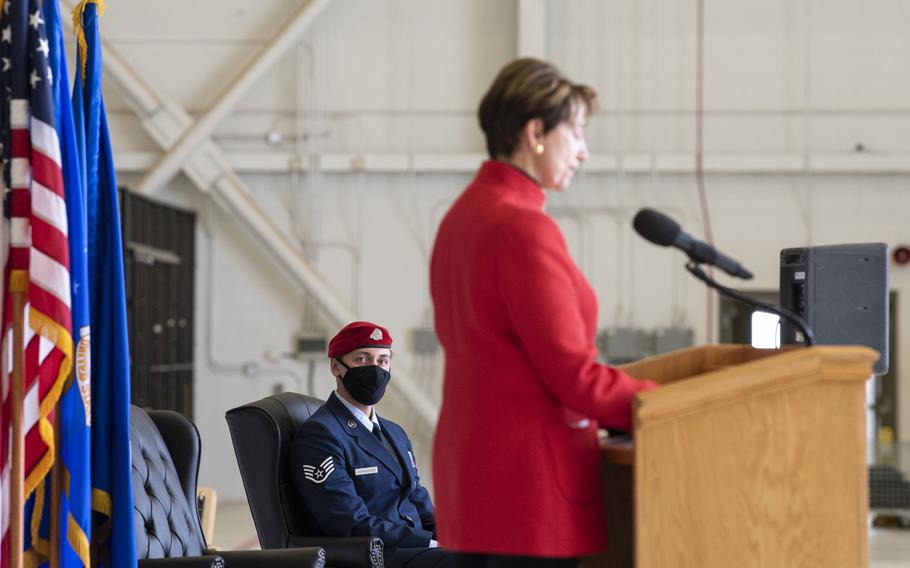 Staff Sgt. Alaxey Germanovich, 26th Special Tactics Squadron combat controller, watches as Barbara Barrett, Secretary of the Air Force, speaks of his accomplishments during an Air Force Cross ceremony Dec. 10, 2020, at Cannon Air Force Base, N.M.