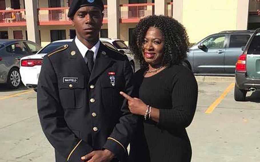 Spc. Henry Mayfield Jr., seen here with his mother Carmoneta Horton-Mayfield, was among three Americans killed on Jan. 5, 2020, at Manda Bay Airfield in southwest Kenya when the base was attacked by insurgents connected to the Somalia-based al-Shabab terrorist group. Defense Department contractors Dustin Harrison, 47, and Bruce Triplett, 64, also died in the attack.
