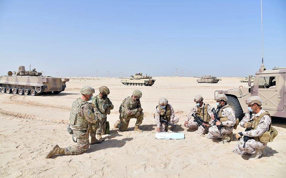 U.S. and Emirati troops discuss plans during a training exercise that ran from Jan. 21 â€“ Feb. 5, 2021, in Abu Dhabi, UAE. 

