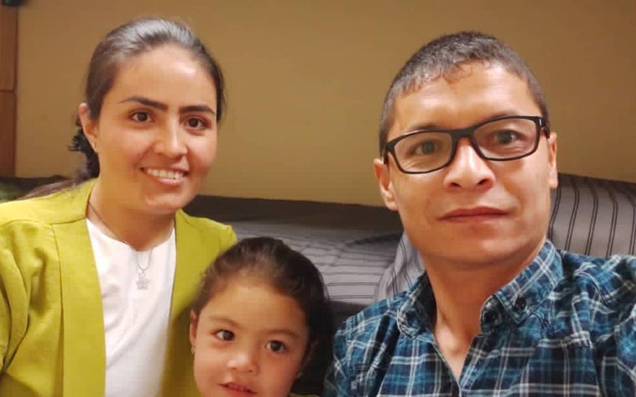 Maj. Mohammed Naiem Asadi, his wife Rahima and their daughter Zainab, 4, in a photo taken Oct. 30, 2020, stayed at Bagram Airfield for several weeks before being told to leave. Asadi and his family have reapplied for refuge in the United States while in hiding. 

