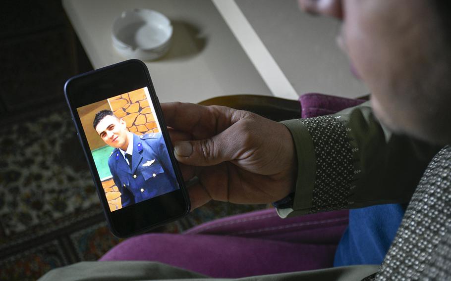 Bashir Ahmad Vesa mourns the death of his brother, Massoud Atal, an Afghan pilot shot by gunmen in Kabul, Afghanistan on Dec. 30, 2020. Vesa keeps photos of his younger brother to keep his memory alive, he said on Jan. 21, 2021. 


