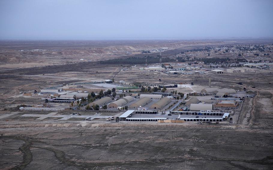 This Dec. 29, 2019, aerial file photo taken from a helicopter shows Ain al-Asad air base in the western Anbar desert, Iraq. 