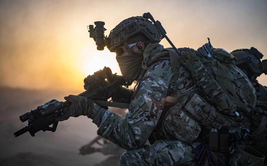 A Special Forces soldier secures the perimeter at an undisclosed location in Afghanistan in February 2020. 
