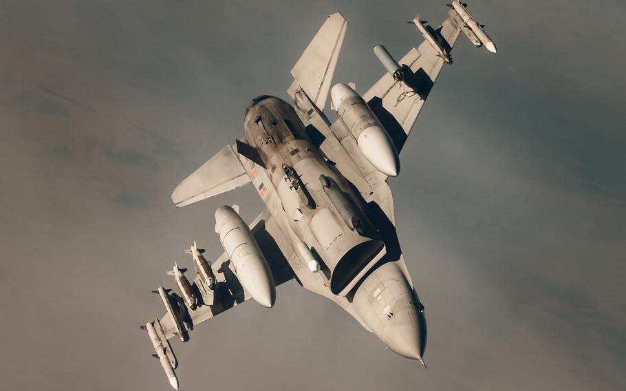 A U.S. Air Force F-16 Fighting Falcon aircraft departs after receiving fuel from a KC-135 Stratotanker aircraft during a mission in southwest Asia, Feb. 16, 2021. The U.S. has conducted hundreds of airstrikes in northern Iraq's mountains as the countr's security forces sweep for Islamic State group remnants.

