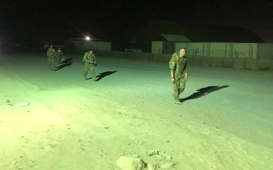 U.S. soldiers with the 28th Expeditionary Combat Aviation Brigade test their minds and bodies at Camp Buehring, Kuwait, during an 18.6-mile timed march, aiming to earn the Norwegian Foot March Badge, April 17, 2021. The event required soldiers to march in their full uniform while wearing a rucksack weighing 25 pounds. 

