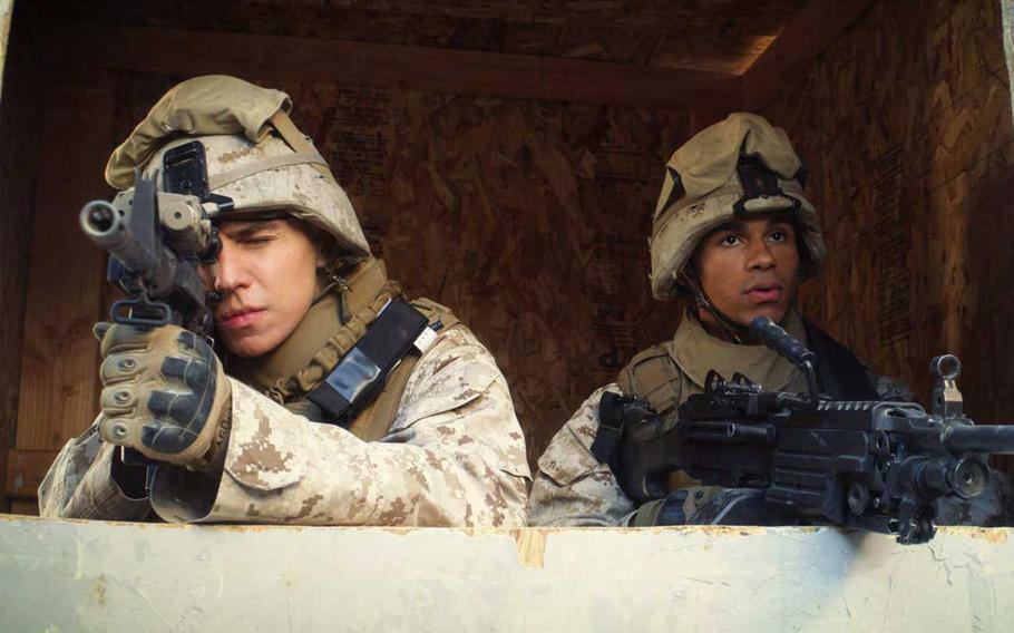 Michael Grant as Lance Cpl. Jordan Haerter, left, and Noah Gray-Cabey as Lance Cpl. Jonathan Yale in a scene from the film ''The 11th Order.'' Yale and Haerter died stopping a bomb-laden truck in Iraq in 2008, saving the lives of many of their comrades. 

