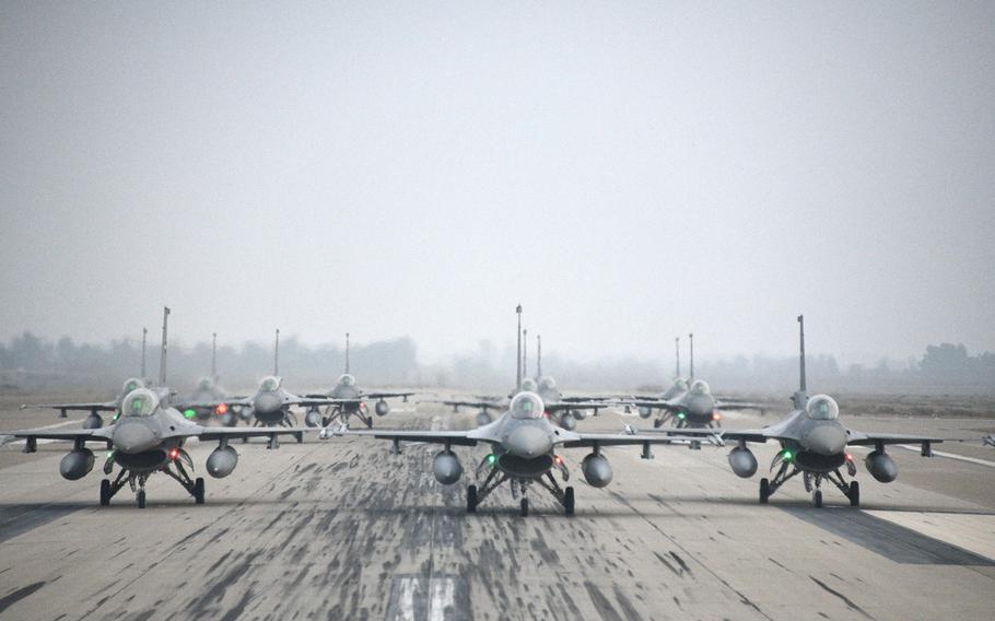 The Iraqi air force performs an F-16 ''elephant walk'' on Balad Air Base, Iraq, in December 2020. An uptick in attacks earlier this year forced U.S. contractors to leave the base where they had been supporting the Iraqi air force's Fighting Falcons.

