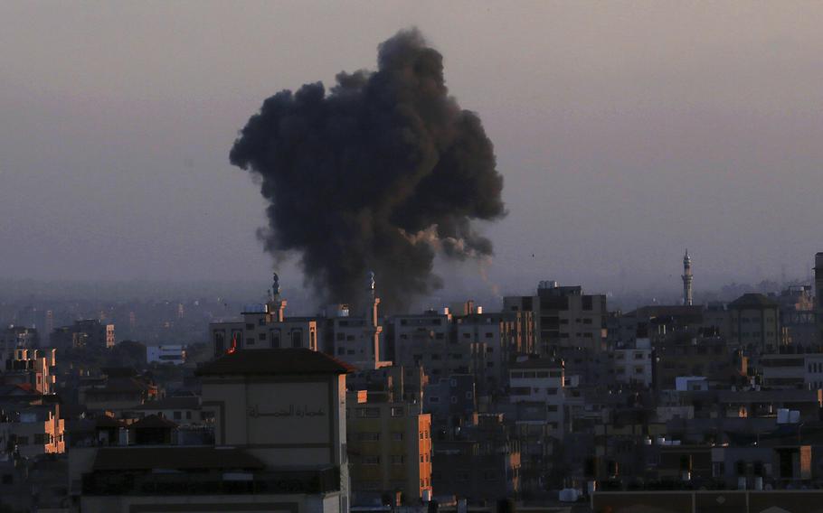 Smoke rises following Israeli airstrikes in Gaza City, Thursday, May 13, 2021. 