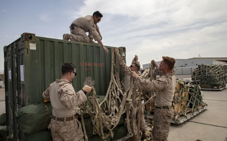 U.S. Marines assigned to the Special Purpose Marine Air-Ground Task Force – Crisis Response – Central Command 19.2, begin their transfer of Taqaddum Air Base, Iraq, Mar. 25, 2020.