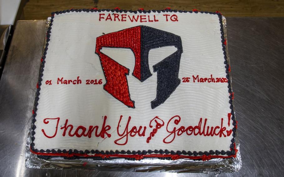 “Thank you and good luck,” said a message inscribed on a cake for the transfer process of Taqaddum Air Base, Iraq, March 25, 2020.