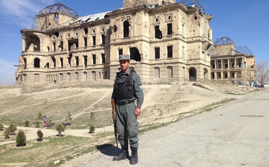 A police officer guards the main driveway to Kabul's bombed-out Darul Aman Palace, Feb. 28, 2016. The palace was refurbished in a multiyear project and recently hosted an Afghan Independence Day celebration.


