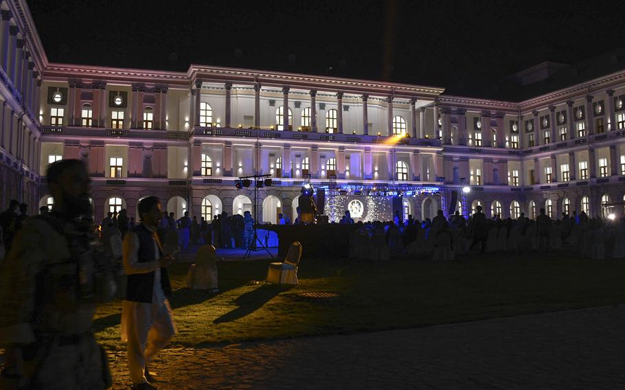 A crowd watches music and dancing acts at Darul Aman Palace during a celebration of Afghanistan’s Independence Day in Kabul on Aug. 18, 2020. 

