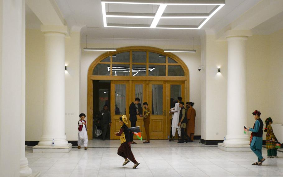 Children play in the halls of the restored Darul Aman Palace in Kabul, Afghanistan after appearing on stage for a celebration of Afghan Independence Day on Aug. 18, 2020. 

