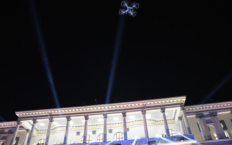 A toy drone flies over the courtyard of Darul Aman Palace in Kabul, Afghanistan during a celebration of the country’s Independence Day on Aug. 18, 2020. The palace, once ravaged by years of war, has been restored and was unveiled one year prior.

