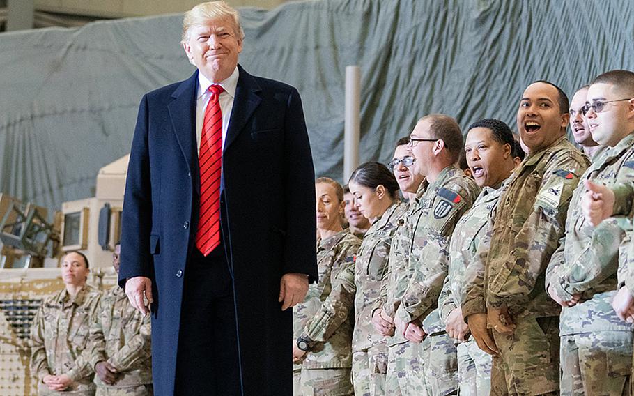 President Donald Trump visits troops at Bagram Airfield, Afghaistan on November 28, 2019, during a surprise Thanksgiving stopover. Media reports indicate Trump will reduce the number of U.S. forces in Afghanistan to 2,500 by mid-January. 

