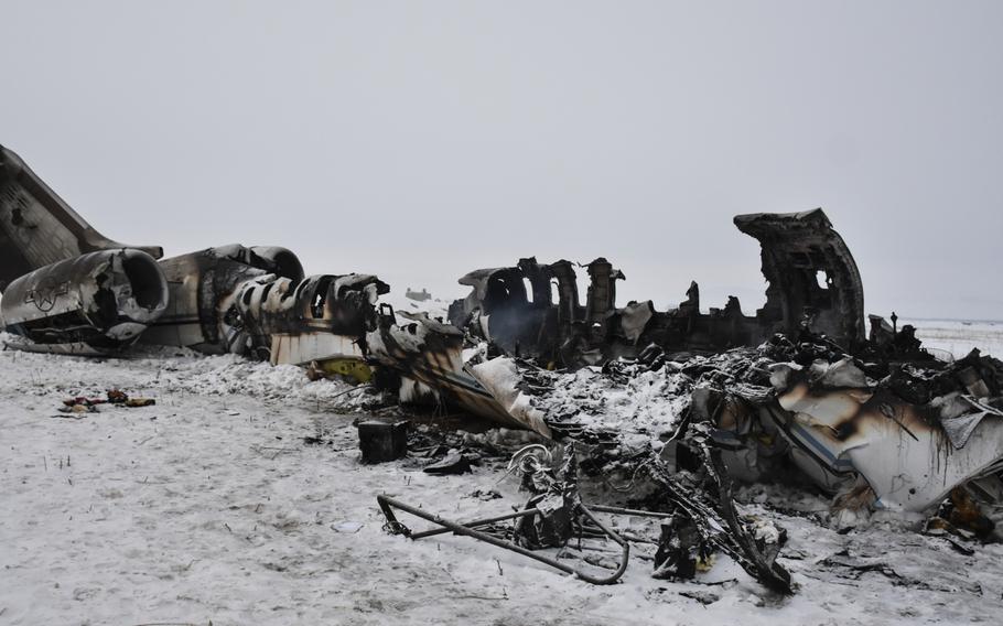 A wreckage of a U.S. military aircraft that crashed in Ghazni province, Afghanistan, is seen Monday, Jan. 27, 2020. 