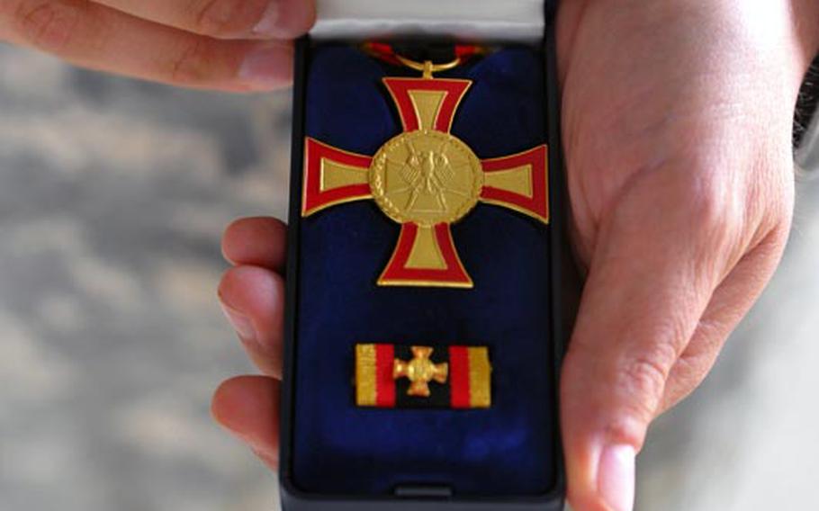 Fourteen members of Companies A and C, 5th Battalion, 158th Aviation Regiment, based in Katterbach, Germany, received Germany&#39;s Gold Cross for valor. They are the first non-Germany troops to receive the medal.