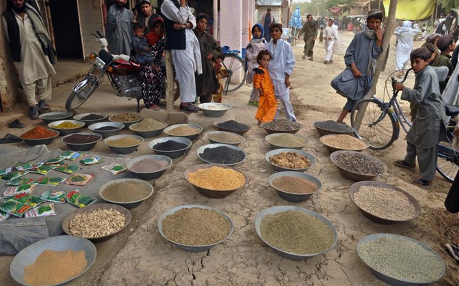 A shop displays grains and seeds for sale at the upgraded Koru Chareh Bazaar in Marjah District. The U.S. Marines spent $600,000 to clean up the once drug-infested marketplace.