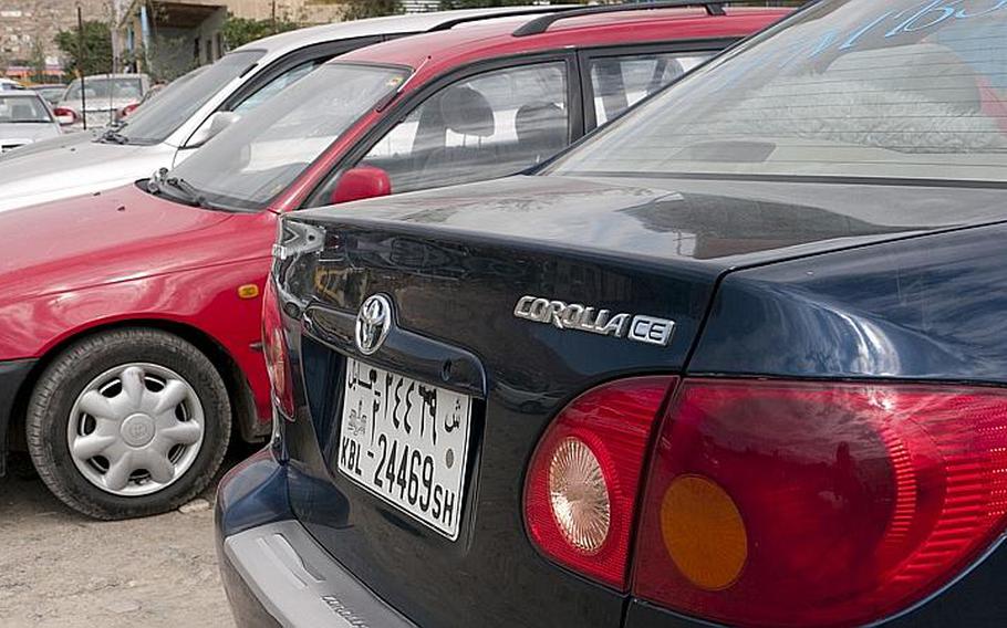 Toyota Corollas line a lot at a car dealership in Kabul. The Afghan capital has seen a boom in car ownership in recent years and the Corolla has remained king, accounting for the vast majority of passenger car sales.