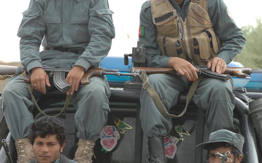 Afghan National Police on guard recently in Tirin Kot, Uruzgan province.