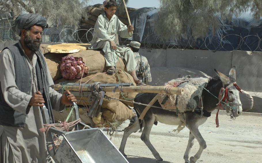 Traders cross from Pakistan into Spin Boldak district, Afghanistan on Sept. 22.