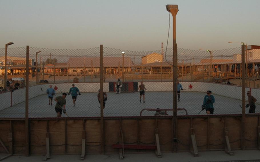 Players scrimmage in preparation for the upcoming season of the Kandahar Hockey League at Kandahar Airfield in southern Afghanistan. Last season, there were 24 teams in the ball hockey league -- 21 made up of Canadians, two from Slovakia and one from the United States.