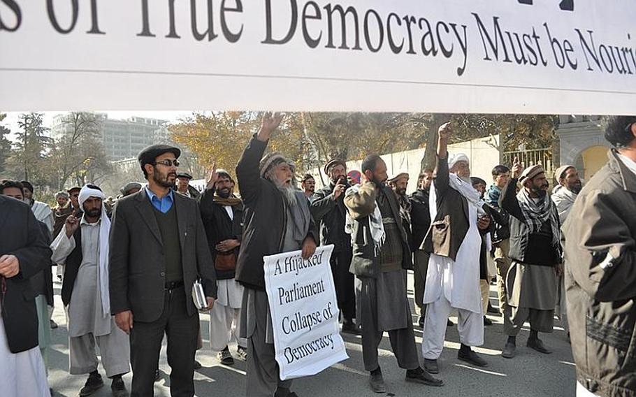 Afghan parliamentary candidates march in Kabul on Nov. 28 to protest the questionable outcome of the fraud-riddled Sept. 18 elections.