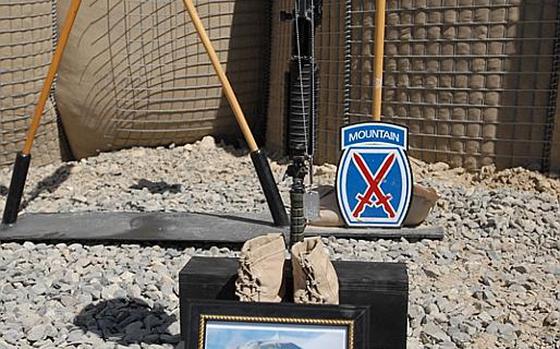 Photograph of Private 1st Class Brandon Owens at a memorial service for him and Sgt. Aaron Smith, who were killed Oct. 2, 2009 by an Afghan police officer known to Americans as Crazy Joe.