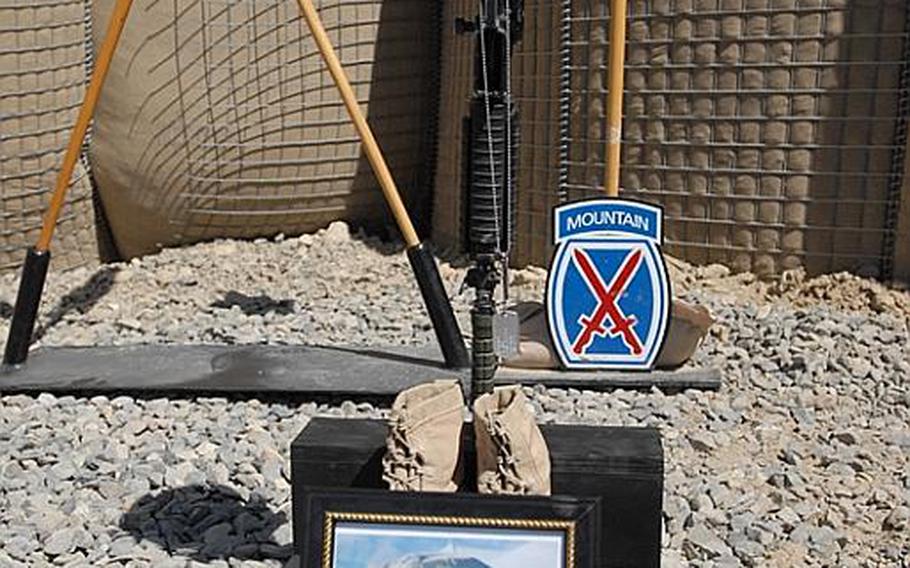 Photograph of Private 1st Class Brandon Owens at a memorial service for him and Sgt. Aaron Smith, who were killed Oct. 2, 2009, by an Afghan police officer known to Americans as Crazy Joe.