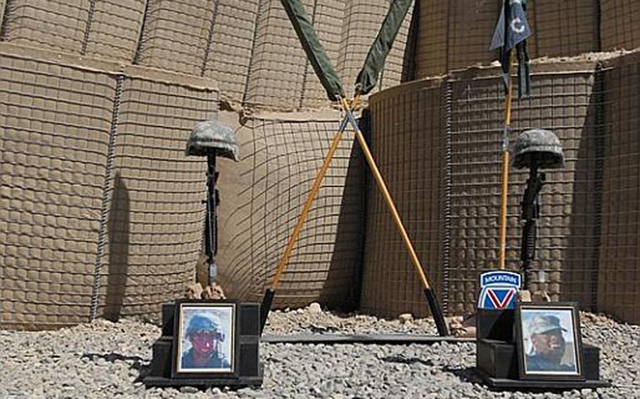 Photographs of Sgt. Aaron Smith, left, and Private 1st Class Brandon Owens, who were killed Oct. 2, 2009, by an Afghan police officer known to Americans as Crazy Joe.