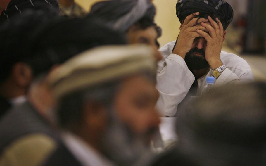Haji Mohameden listens Thursday during a Taliban reintegration shura at Forward Operating Base Pasab, Afghanistan.