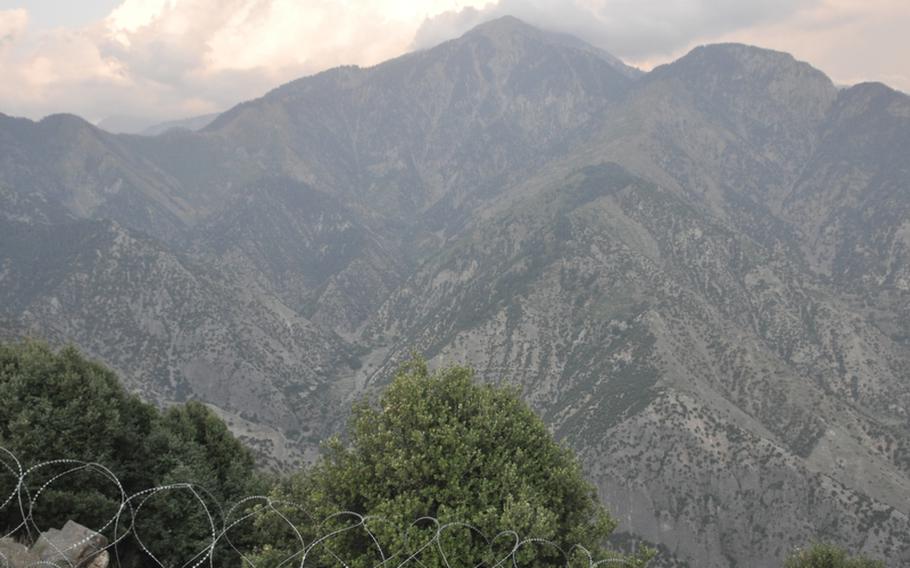 The border of Pakistan lies just beyond the tallest mountain at the center of this photo, taken last week at Observation Point Mustang in eastern Kunar province.