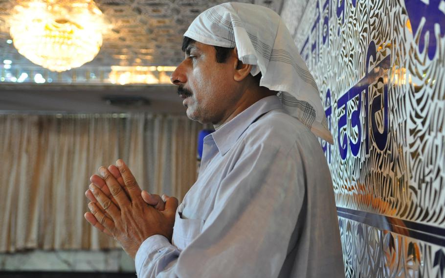 A worshipper at a Sikh temple in Kabul. The Sikh and Hindu community has been in Afghanistan for centuries but harassment, poverty and violence have pushed most of its members to leave Afghanistan.