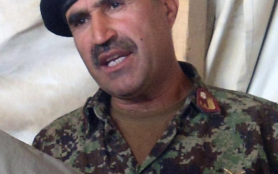 Afghan Col. Mohammad Wasil and members of his command staff are suspected of pocketing the wages of Afghan soldiers, selling supplies allocated for troops and extorting subcontractors who worked on the base.