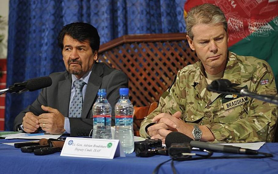 Afghan Ministry of Defense spokesman Gen. Mohammed Zaher Azimi and British Lt. Gen. Adrian Bradshaw, deputy commander of the International Security Assistance Force, speak at a news conference Sept. 6, 2012, in Kabul about the recent trend of Afghan soldiers killing Western troops.