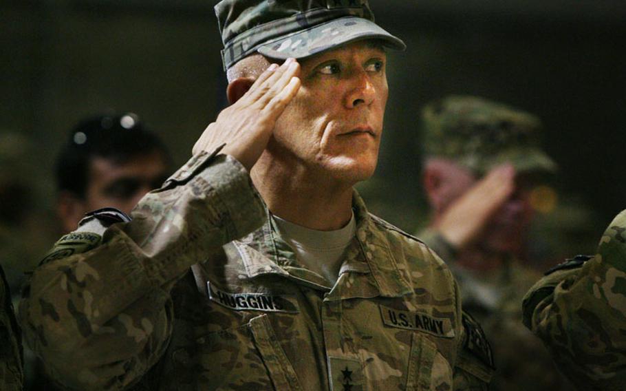 Regional Command-South Commanding General, Maj. Gen. James L. Huggins Jr., salutes during a  Sept. 2 Transfer of Authority ceremony Kandahar Airfield, Afghanistan. Huggins, of the 82nd Airborne Division, transferred authority of RC-South to Maj. Gen. Robert B. Abrams of the 3rd Infantry Division.