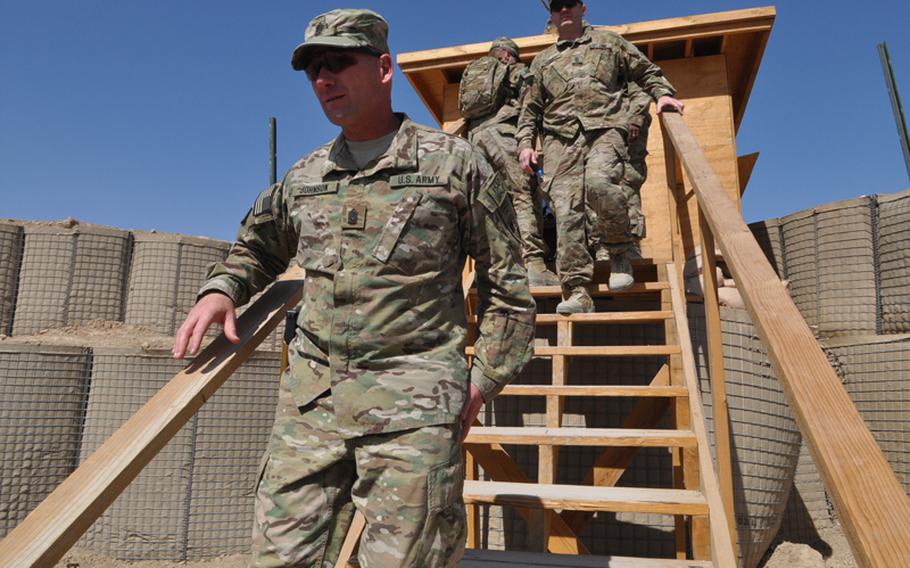 Command Sgt. Maj. Bill Johnson (foreground), tours Bagh-e-Pul, a police mentoring base in Kandahar, during a battlefield circulation Sept. 27, 2012.