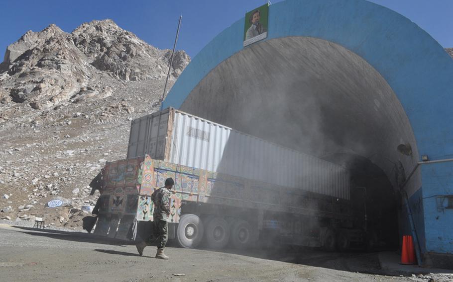 A truck enters the Salang Tunnel, a high-elevation roadway through the Hindu Kush Mountains that is not only a vital road-link for NATO supply trucks heading from Tajikistan into Afghanistan but also a key to Afghan commerce. The U.S. Army Corps of Engineers recently awarded a $12.8 million contract to an Afghan company to improve the crumbling tunnel, which has been the scene of many fatal accidents.