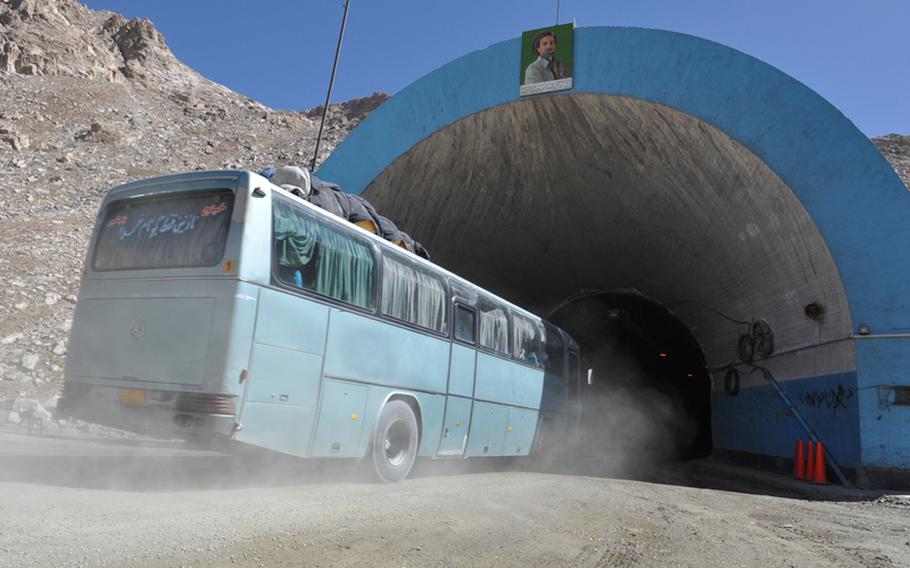 A bus enters the Salang Tunnel, a link for both NATO and Afghan truckers to Tajikistan. The U.S. Army Corps of Engineers recently awarded a $12.8 million contract to improve the tunnel, which has been plagued by deadly accidents.