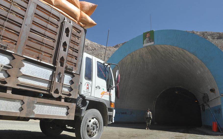 A truck prepares to enter the Salang Tunnel, a key road link located more than 11,000 feet up in the Hindu Kush mountains. A rutted roadway, poor visibility and avalanches have caused many deadly accidents in and around the tunnel and a $12.8 million U.S. Army Corps of Engineers project is aimed at improving the tunnel.